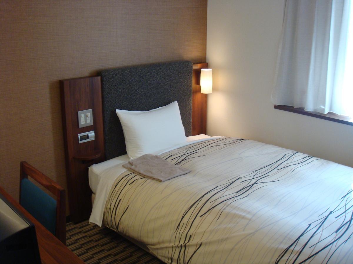 Uozu Manten Hotel Ekimae Rum bild