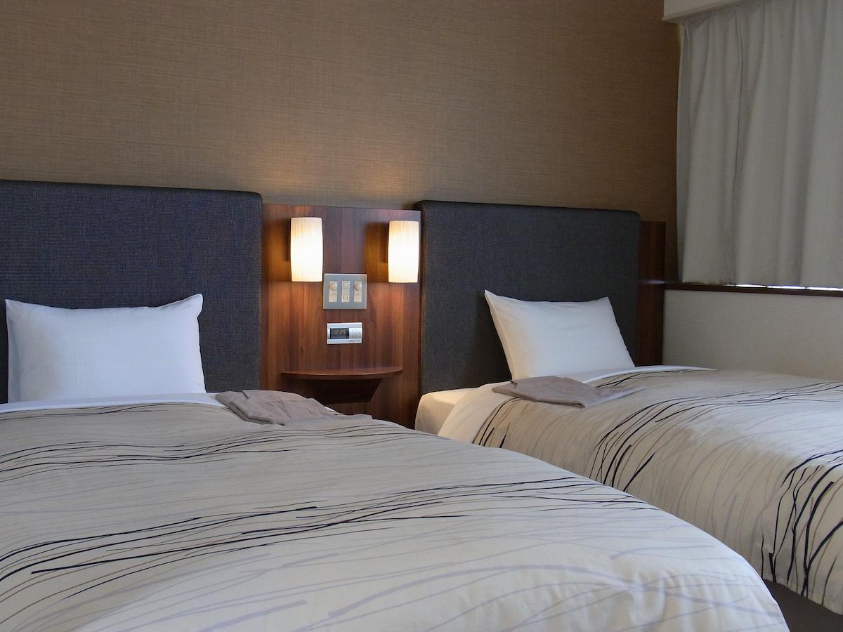 Uozu Manten Hotel Ekimae Rum bild